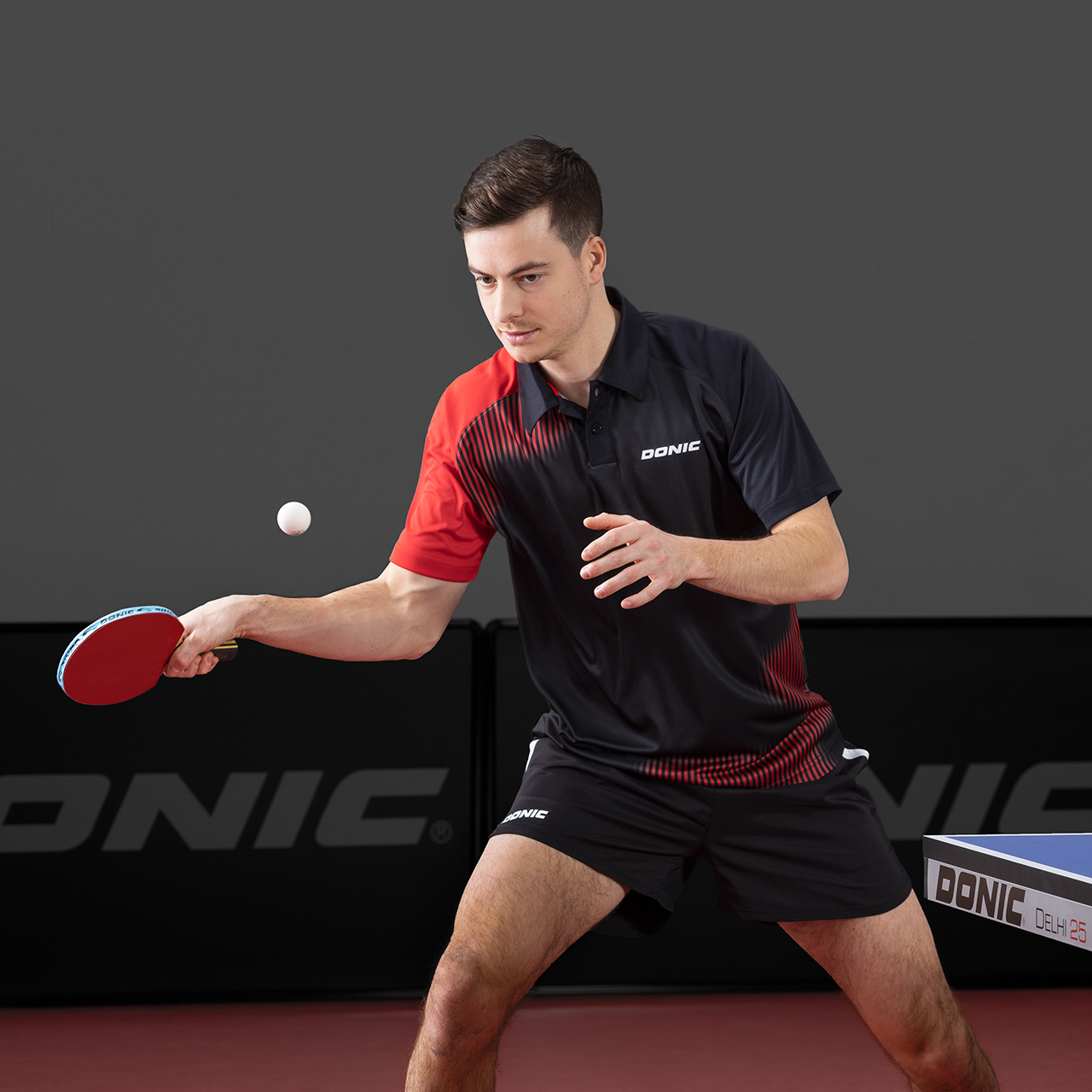 donic-polo_caliber_black_red-player-web DONIC Poloshirt Caliber schwarz/rot player