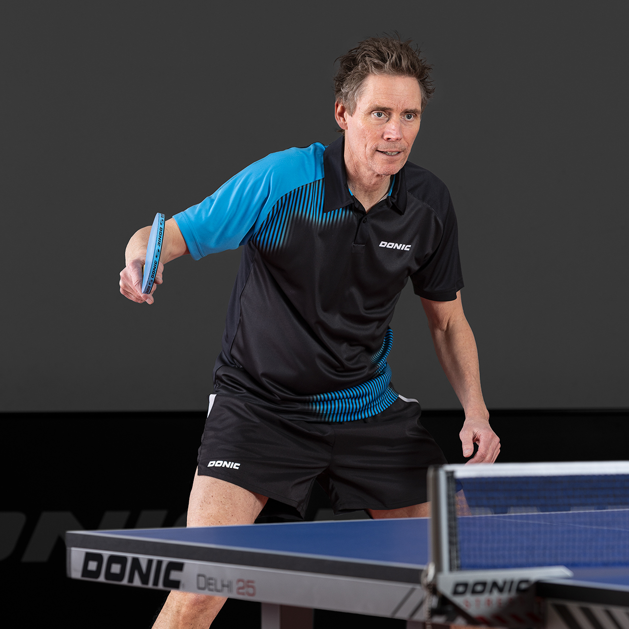 donic-polo_caliber_black_cyan-player-web DONIC Poloshirt Caliber schwarz/cyan player